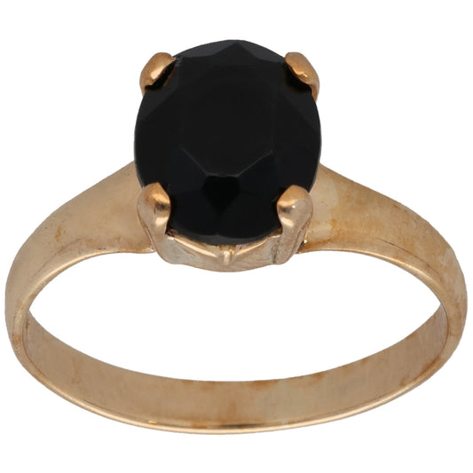 Gold-tone single-stone ring with faceted black octagon gem, size P