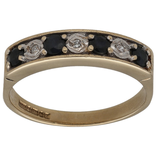 9ct gold half eternity ring with dark sapphire and round diamond accents, front view