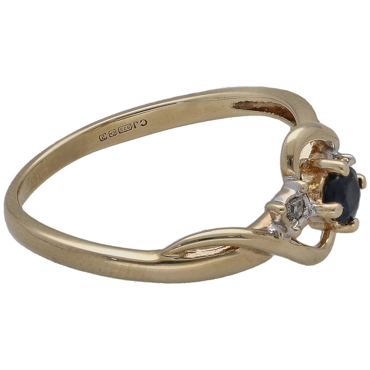 Yellow gold ring with dark blue sapphire in prong setting and two round diamonds, side view