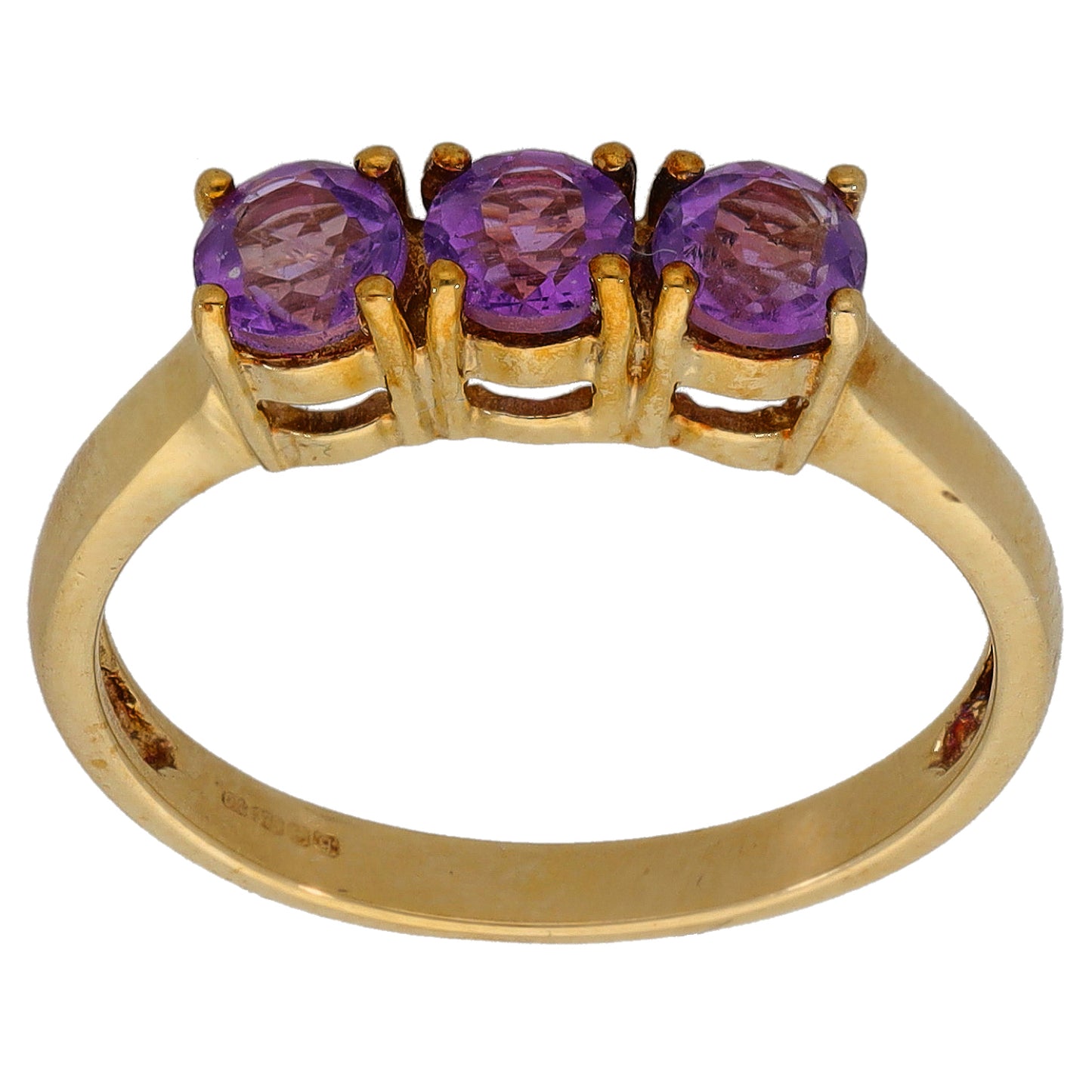 Gold three-stone amethyst ring with three purple oval gems in raised setting