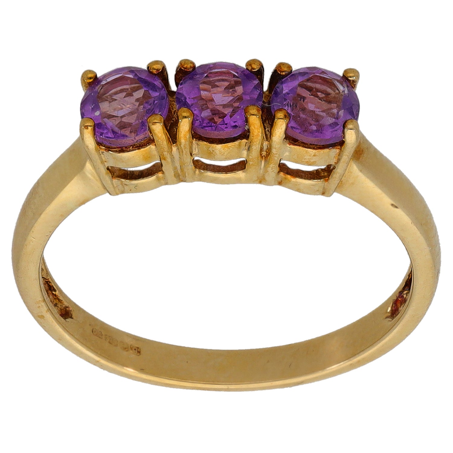 Gold three-stone amethyst ring with three purple oval gems in raised setting