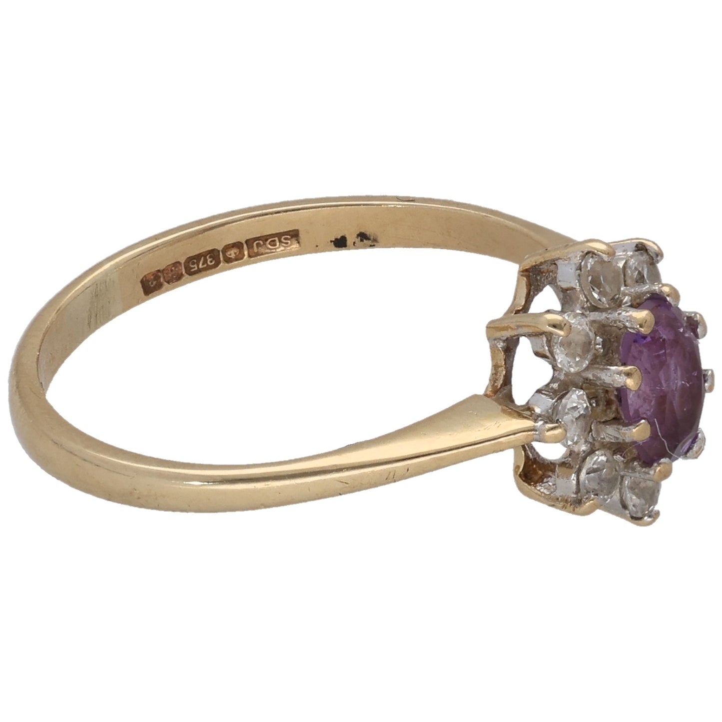 9ct gold cocktail ring side view with purple oval stone and clear round clusters