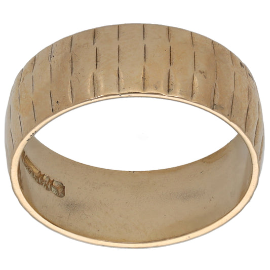 9ct gold patterned wedding ring with vertical textured outer band and plain inner rim