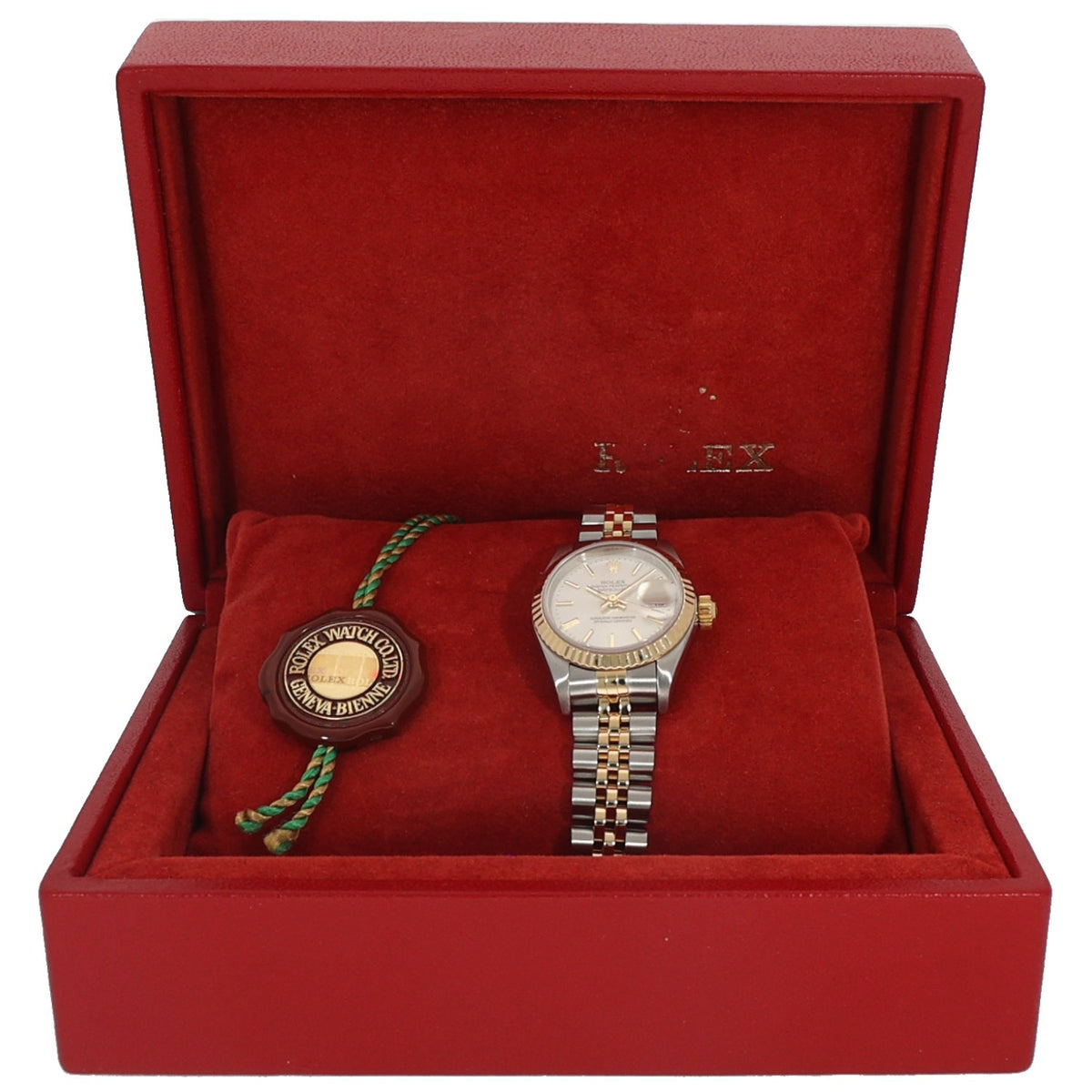 Rolex Datejust 79173 two-tone steel wristwatch with champagne dial and gold bracelet.
