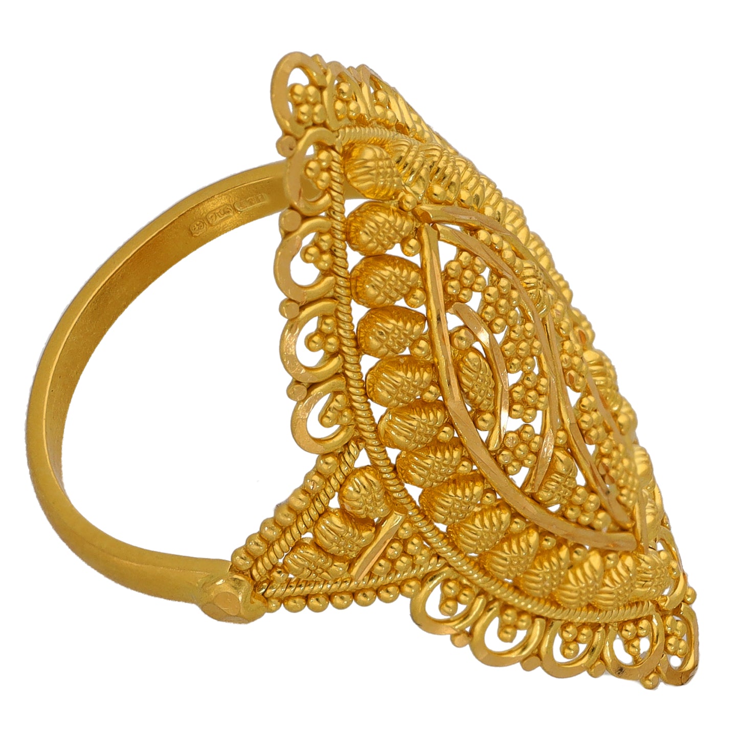 Gold-tone filigree ring, size N, angled side view with openwork arches and scrolls
