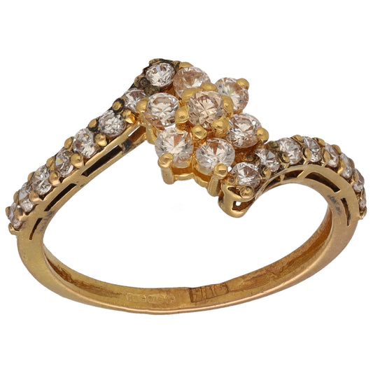 Gold-tone CZ cocktail ring with cluster of round clear stones on top and sides