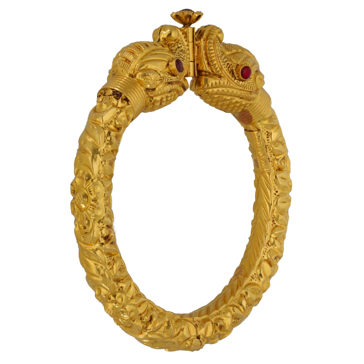 22ct Gold-tone hinged bangle with ornate texture and red gemstone in oval clasp