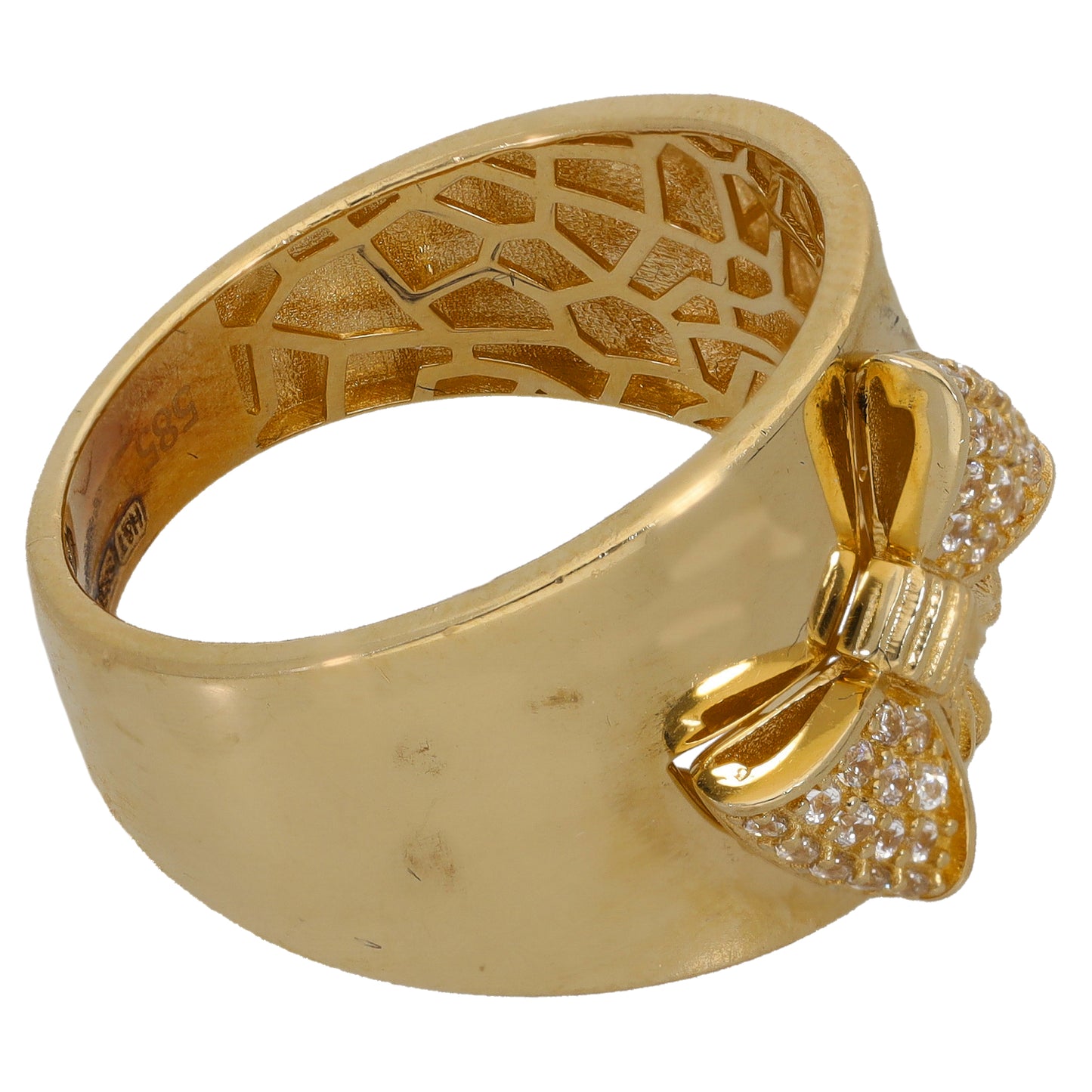 Gold-tone ring with heart-and-bow CZ stones and patterned inner band