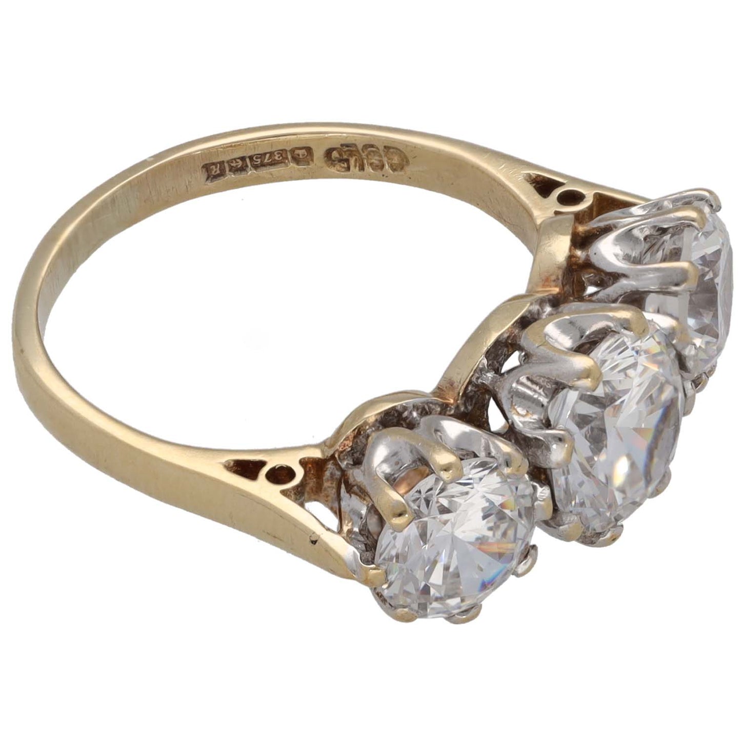 9ct gold three-stone CZ ring, side view with three round clear stones and hallmark