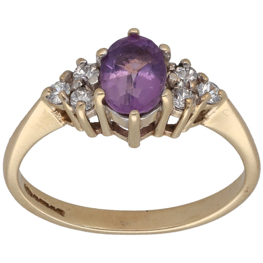 9ct gold ring with oval amethyst center and clear CZ side stones