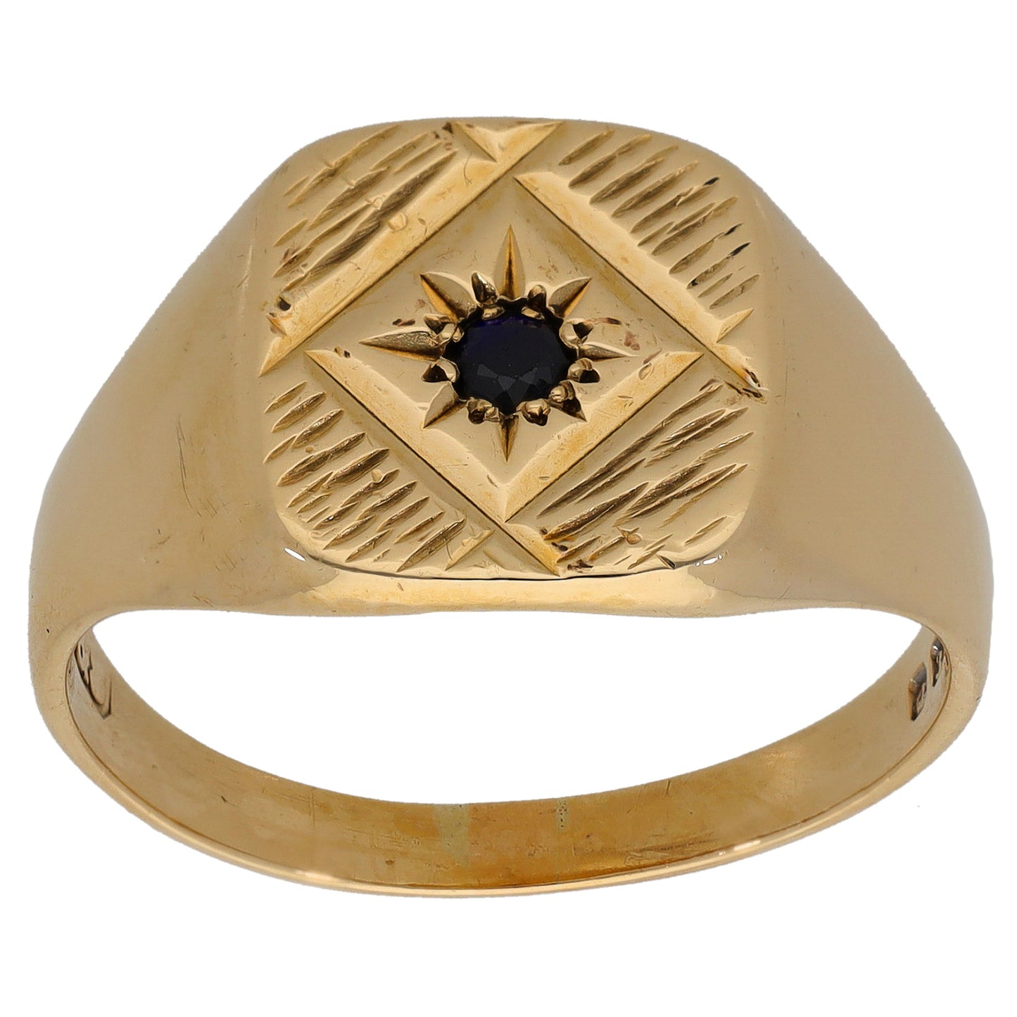 9ct gold signet ring with starburst dark sapphire on carved geometric panel