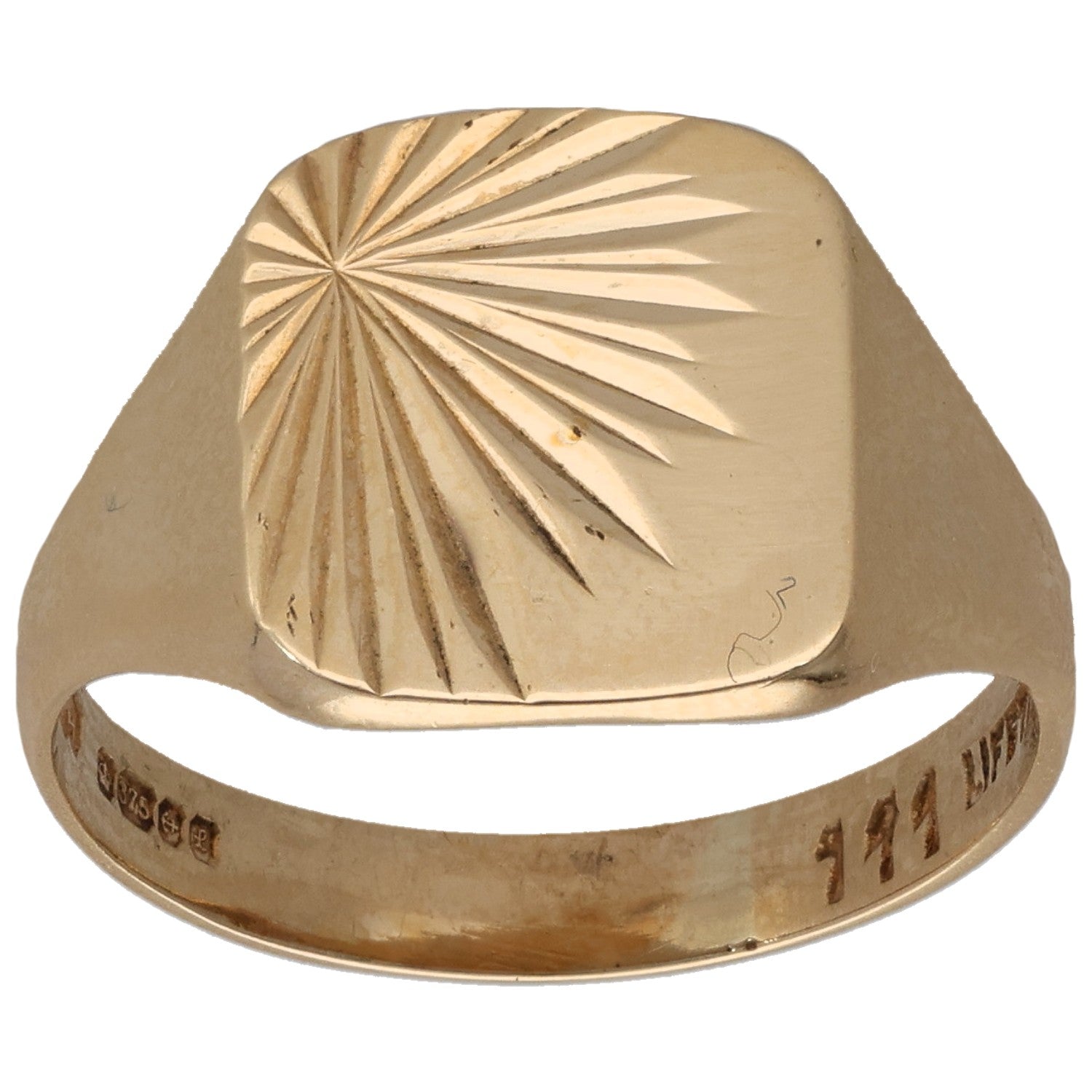 Gold signet ring with faceted sunburst-style engraved pattern on top