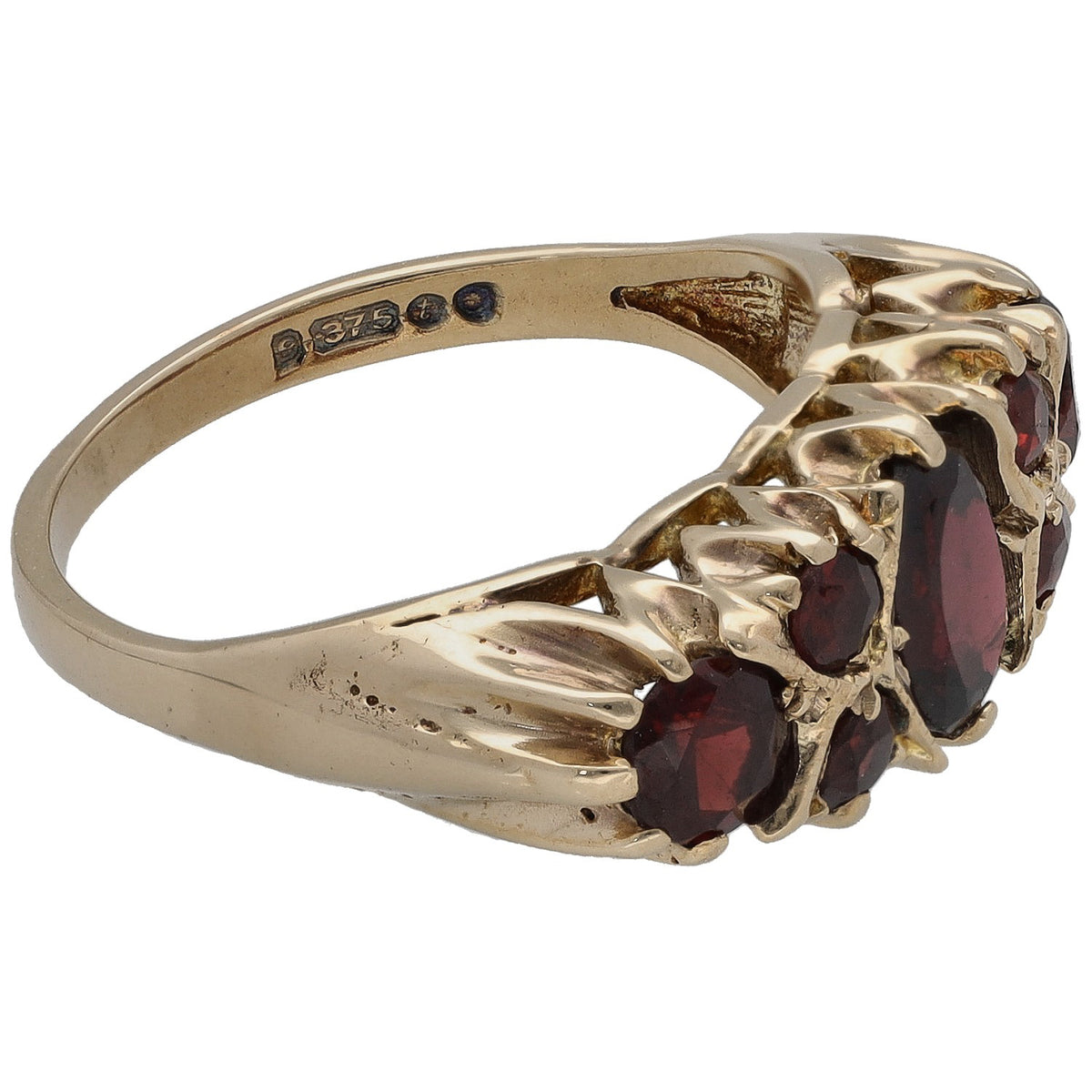 Gold garnet cocktail ring side view with marquise and oval burgundy stones, prong set