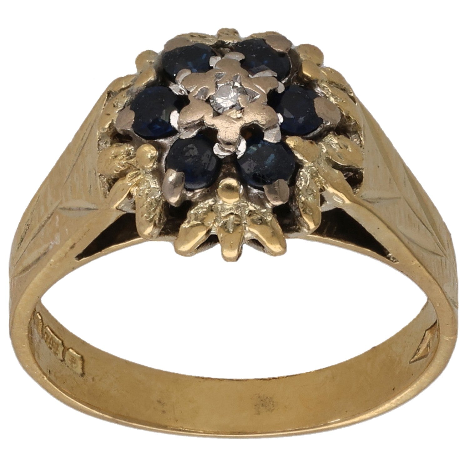 Gold cocktail ring with dark sapphire-style cluster and small round diamond accents