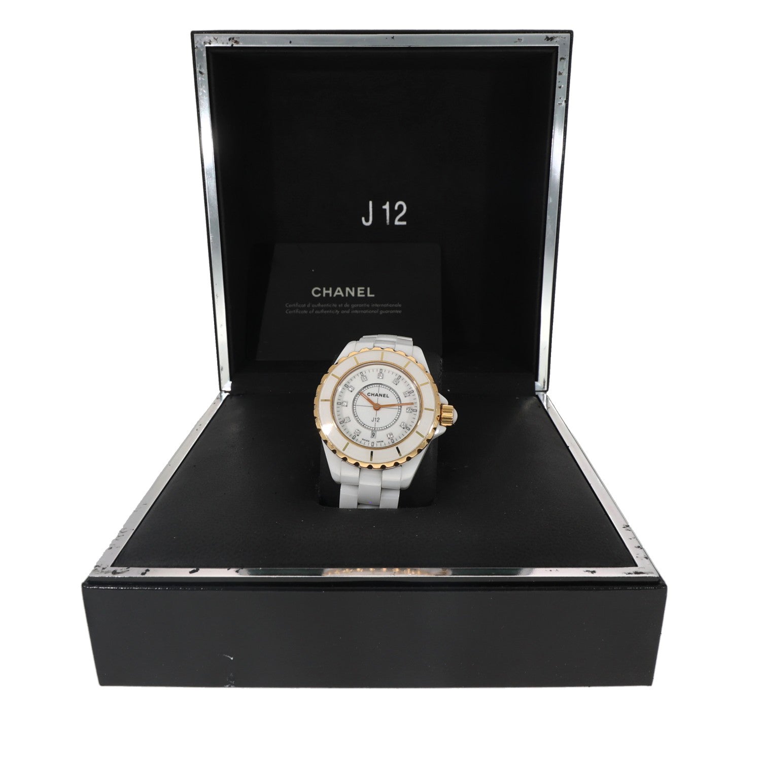 cahnel j12, white ceramic case and bracelet, gold bezel, diamond hour markers, box image