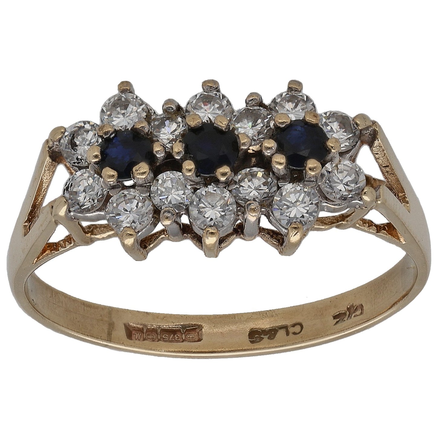 Gold dress ring with cluster of dark blue and clear crystal stones