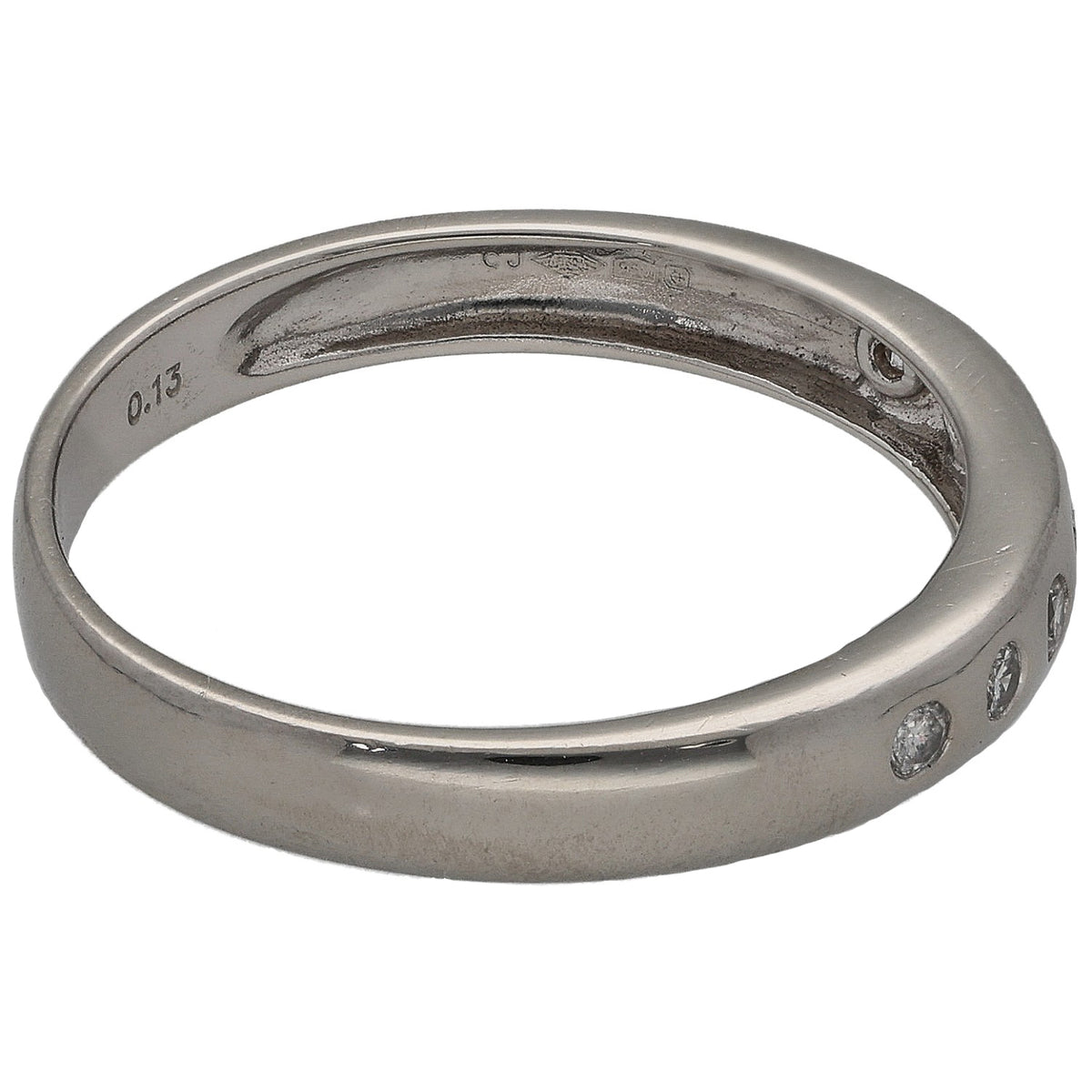 Platinum half-eternity diamond ring, side view with small round stones set