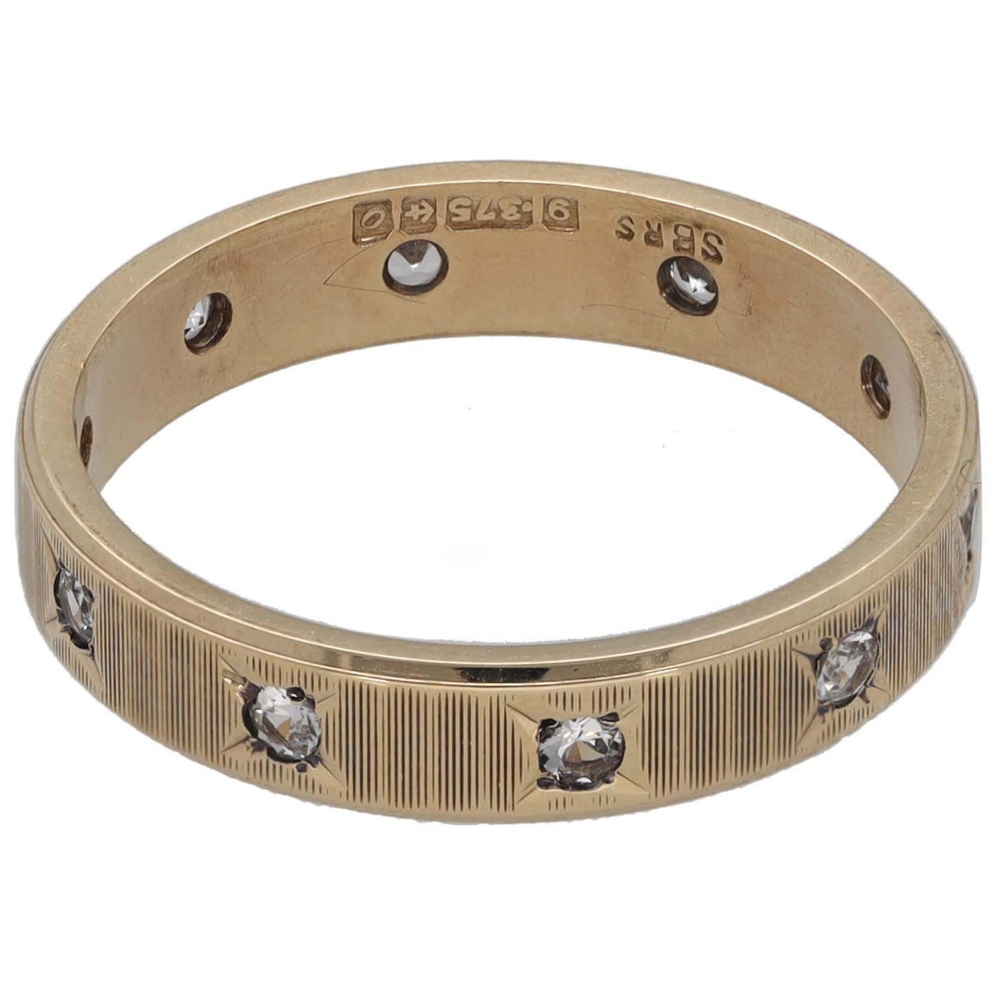 Gold-tone CZ wedding ring with vertical ridged band and stones set around the rim