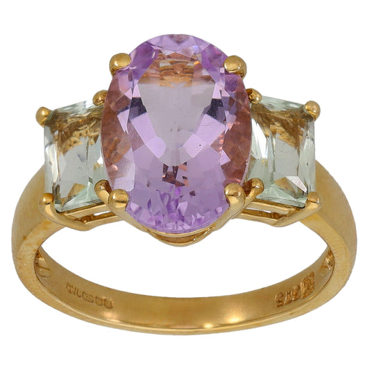 9ct gold ring with oval amethyst center and two square-cut pale stones, size K
