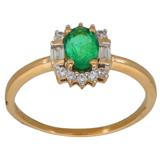 Gold cocktail ring with oval green center stone and clear side stones, square settings