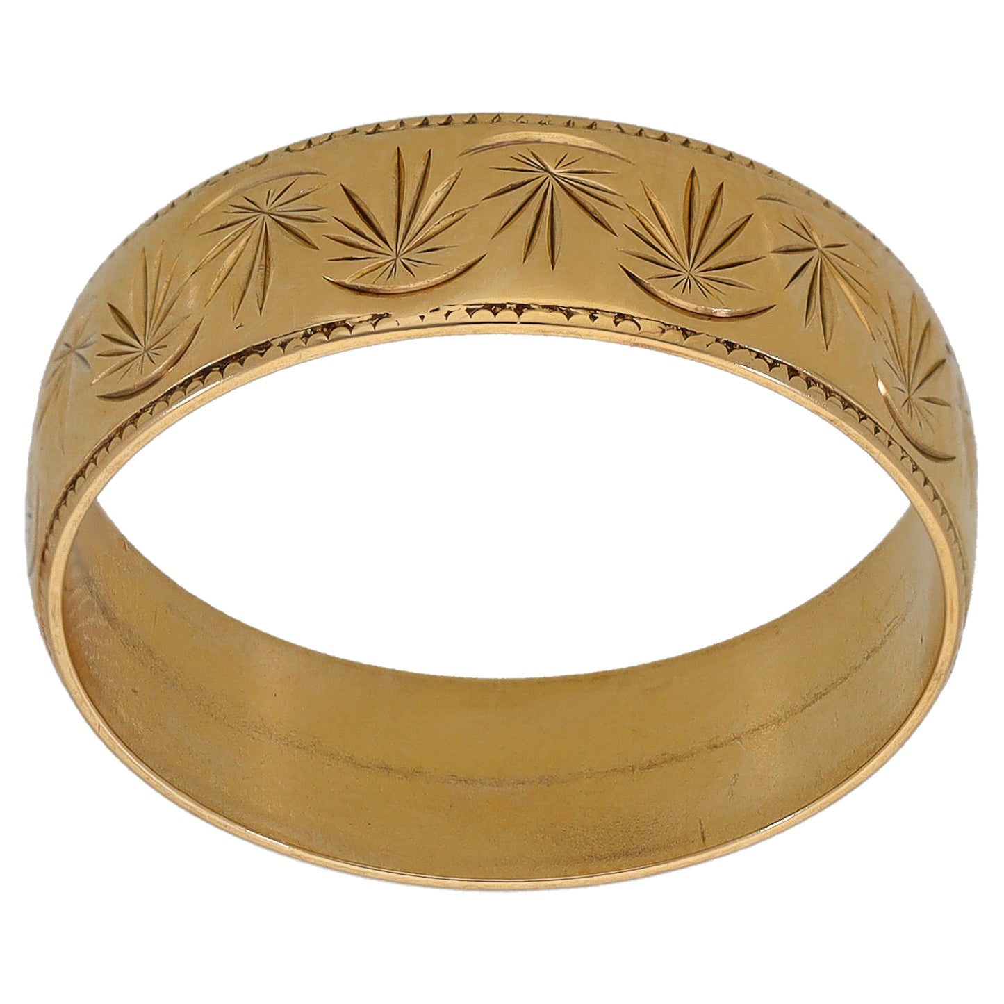 9ct gold patterned wedding ring with engraved starburst leaves