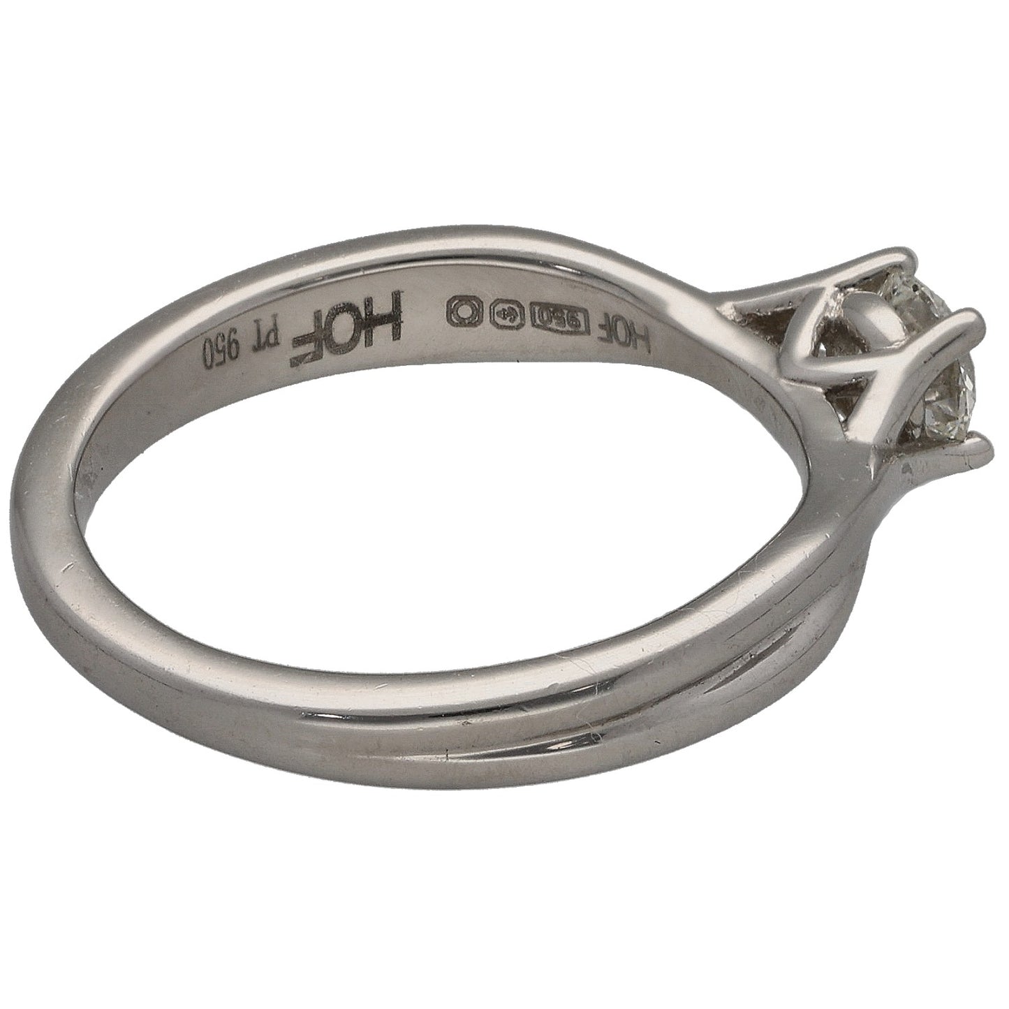 Platinum solitaire diamond ring with engraved band and prong-set stone