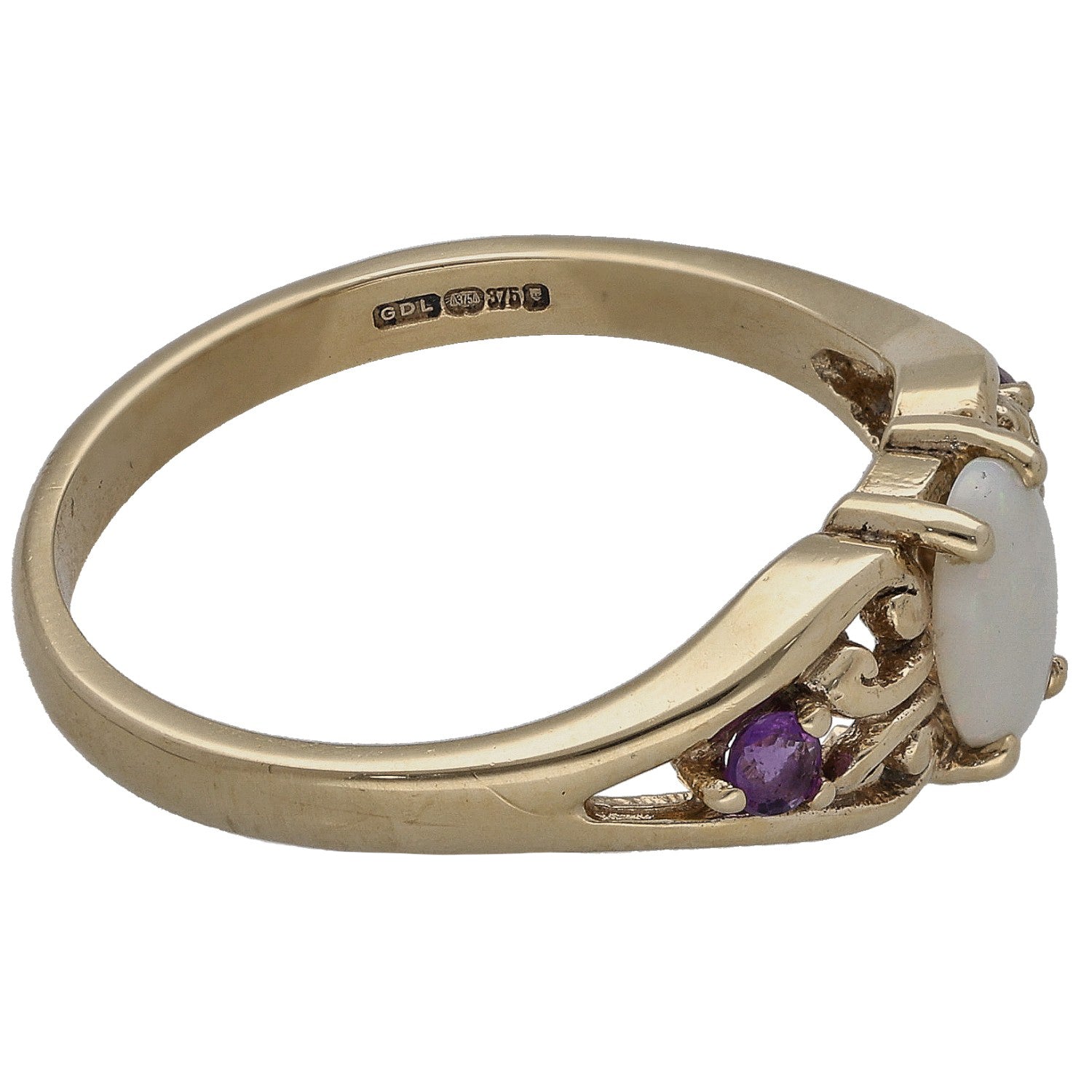 9ct gold ring with oval opal setting and purple amethyst accents, hallmark visible