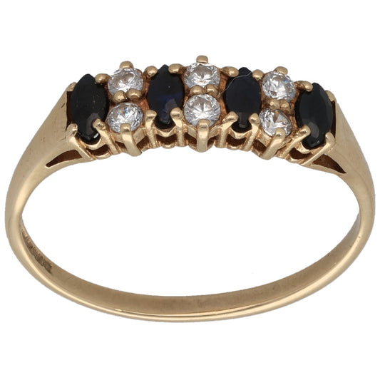 9ct gold half-eternity ring with dark oval stones and clear round accents