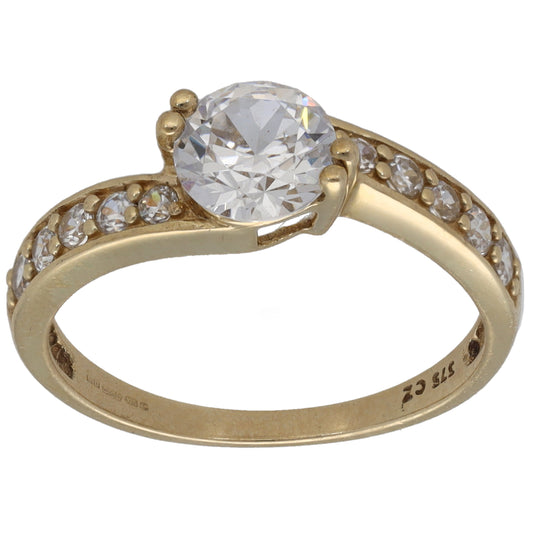 Gold-tone CZ single-stone ring with side accent stones and round center stone