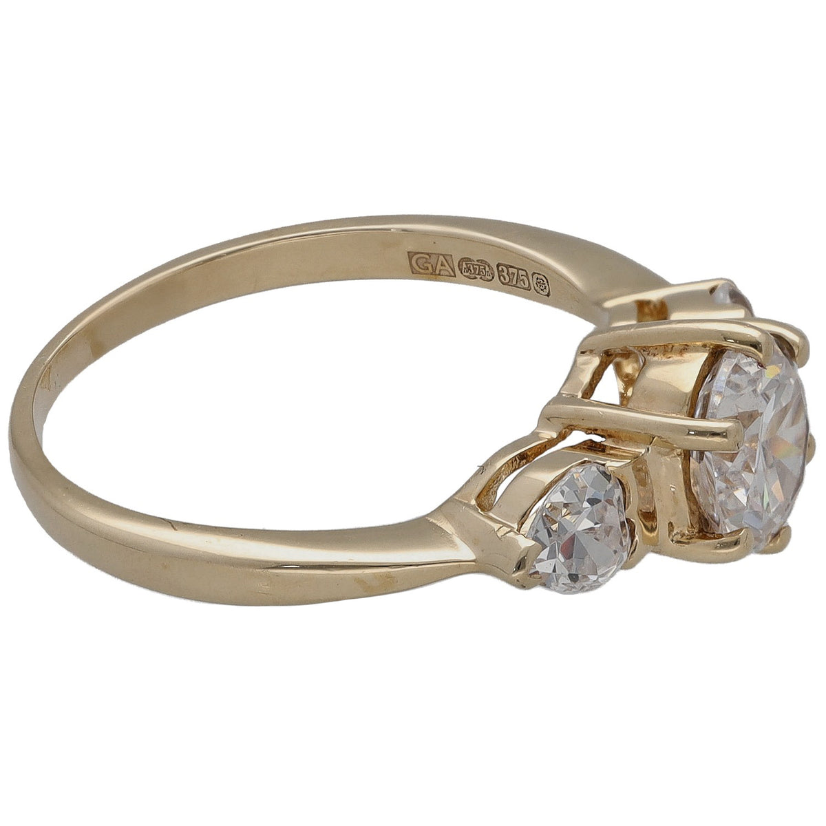 Gold CZ ring side view with central stone, small round accents, hallmark on inside