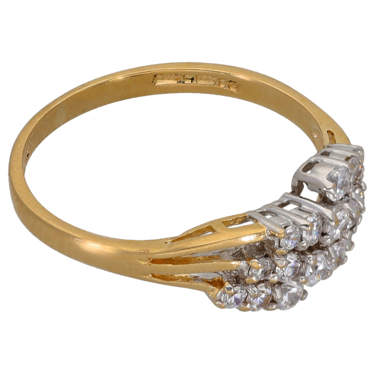 Two-tone gold ring with oval CZ cluster and small clear stones on raised side