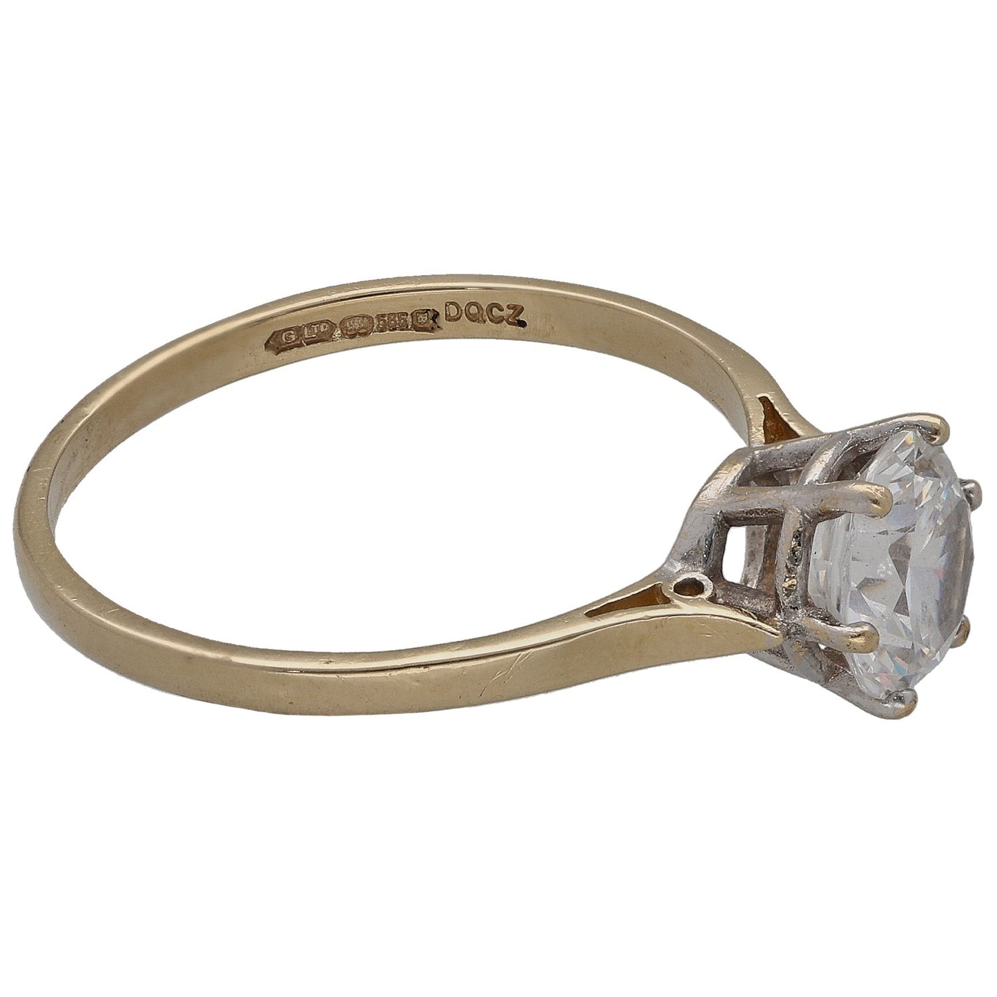 Gold-tone ring with round clear CZ side view, four prongs and inner hallmark