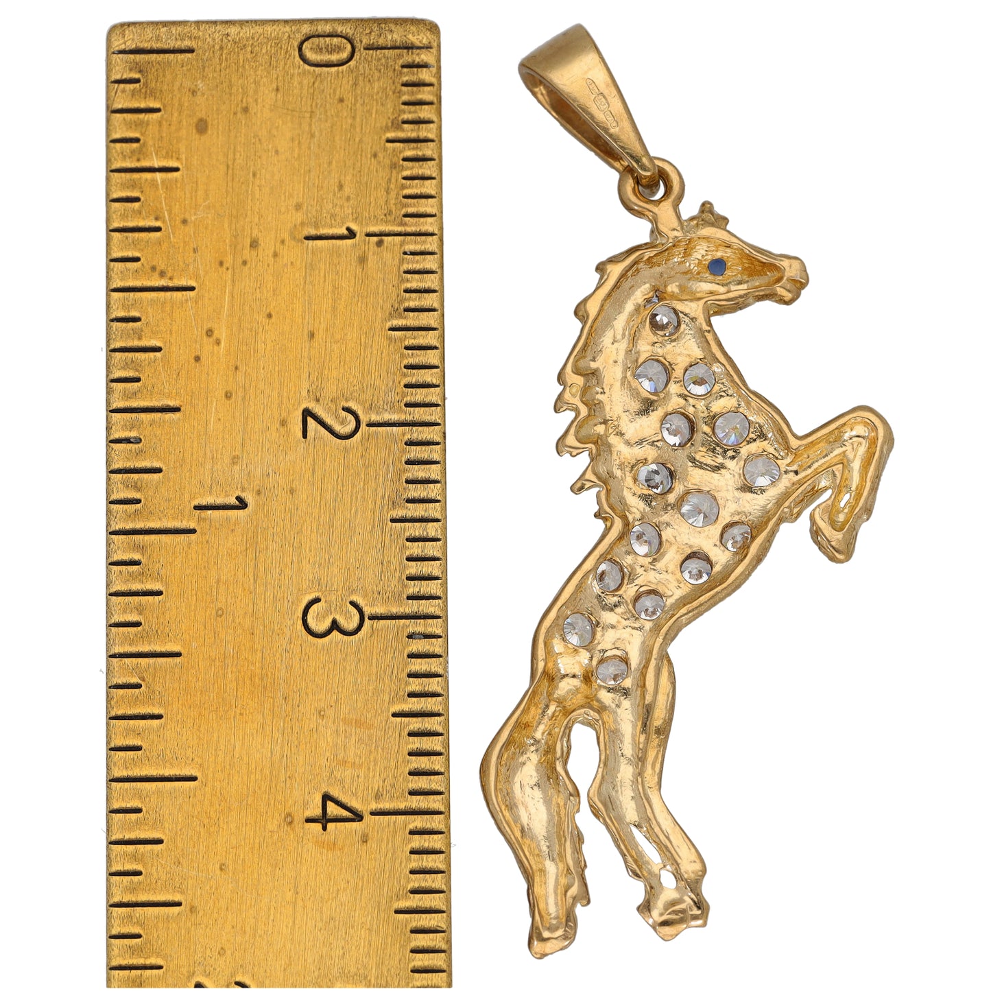 Gold-tone horse pendant studded with clear stones and small blue accents