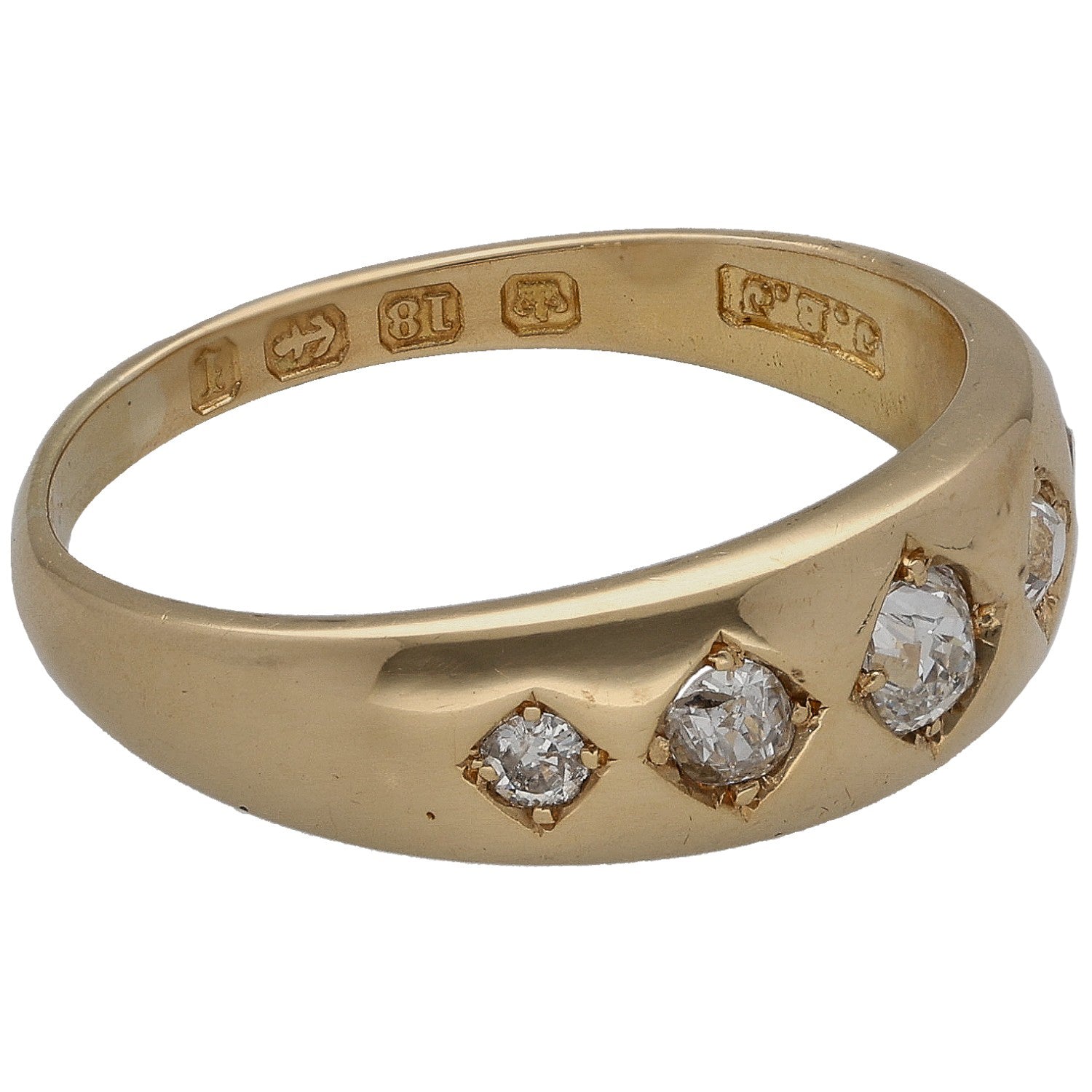 Gold diamond ring, side view with three round stones and engraved band marks