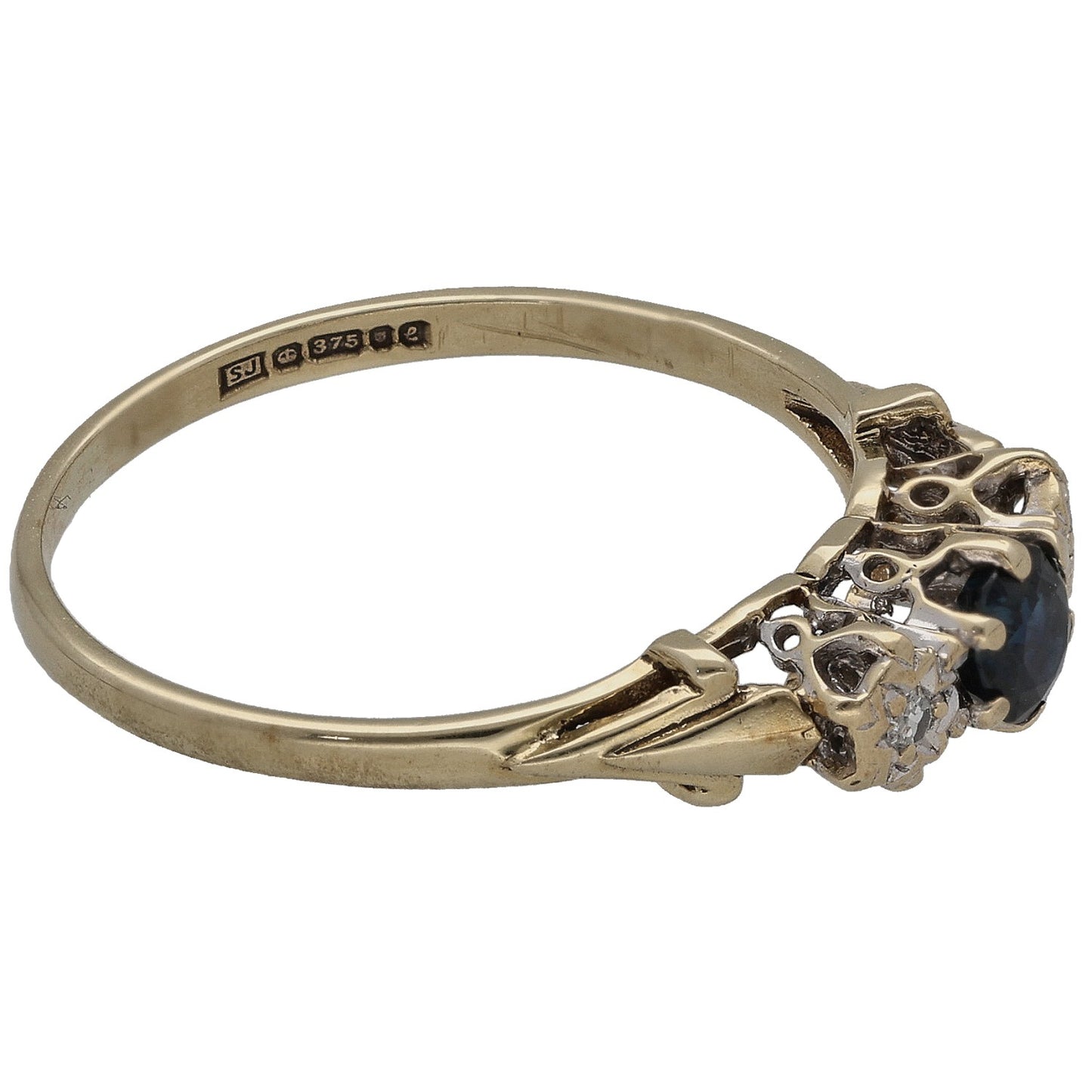 9ct gold sapphire and diamond three-stone ring, side view with dark blue center stone