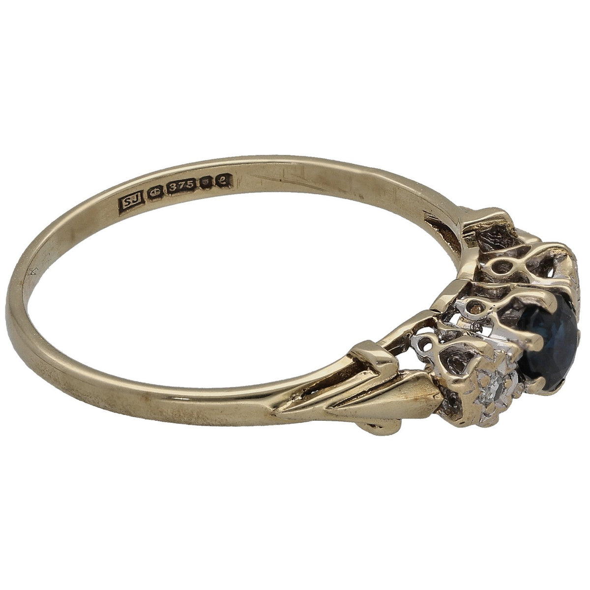 9ct gold sapphire and diamond three-stone ring, side view with dark blue center stone