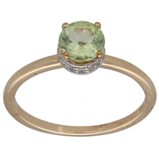 9ct gold cocktail ring with pale green beryl and imitation stone setting