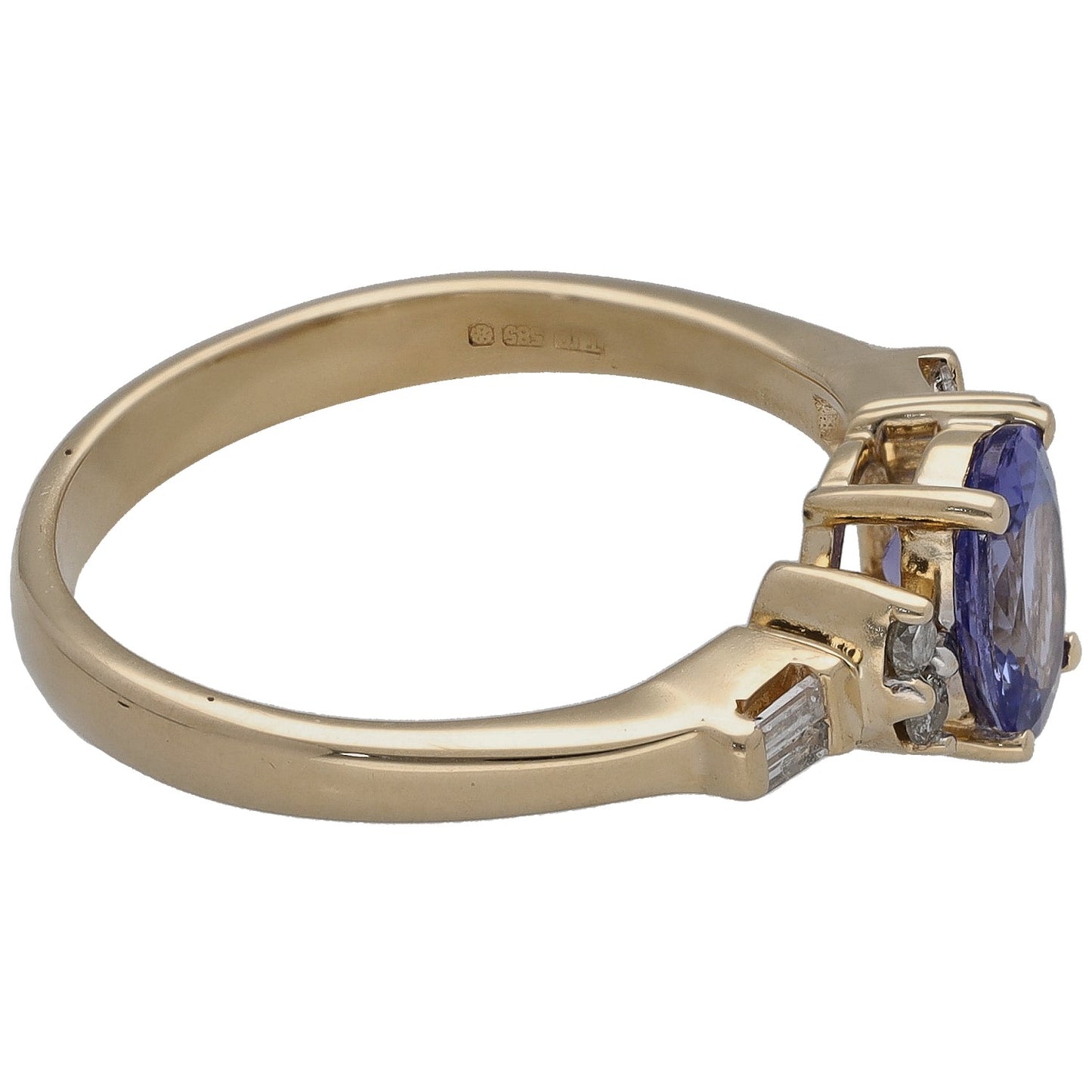 14k gold ring side view with blue-violet tanzanite stone and baguette diamond accents