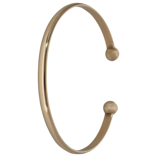 9ct gold torque bangle, polished oval with rounded ball terminals