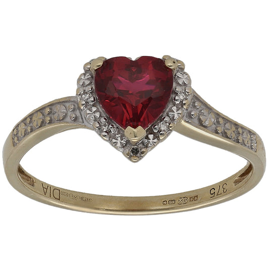 Heart-cut red gemstone solitaire ring in gold with diamond accents