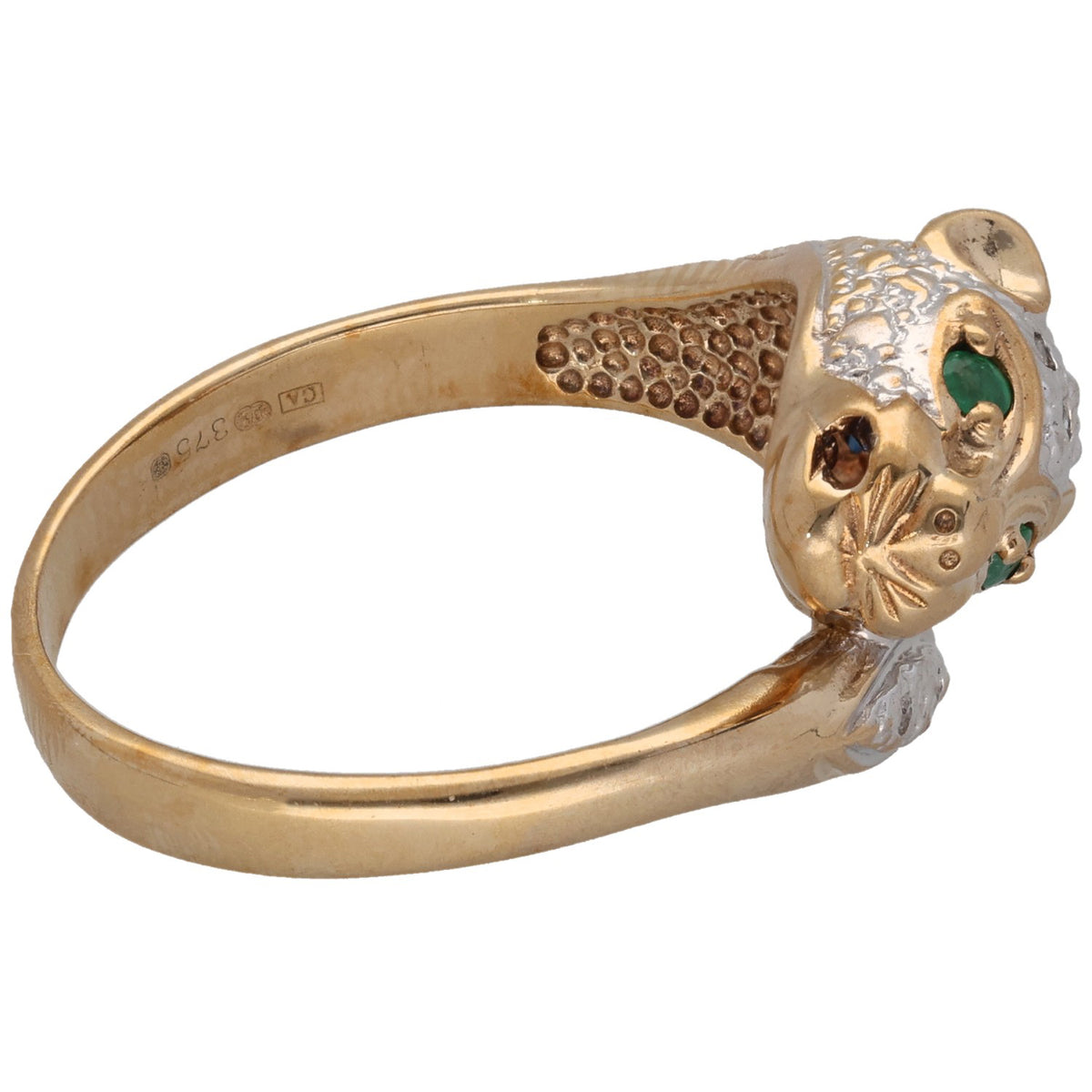 Gold-tone band with animal head design, green eye stone and dark blue accents