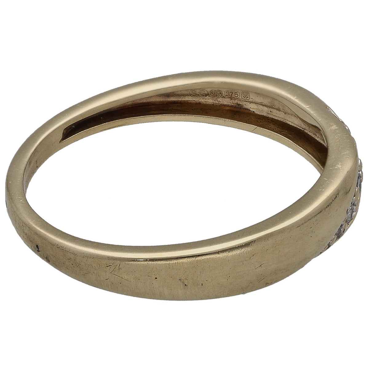 Yellow gold wedding ring side view with inner hallmark stamp and smooth band