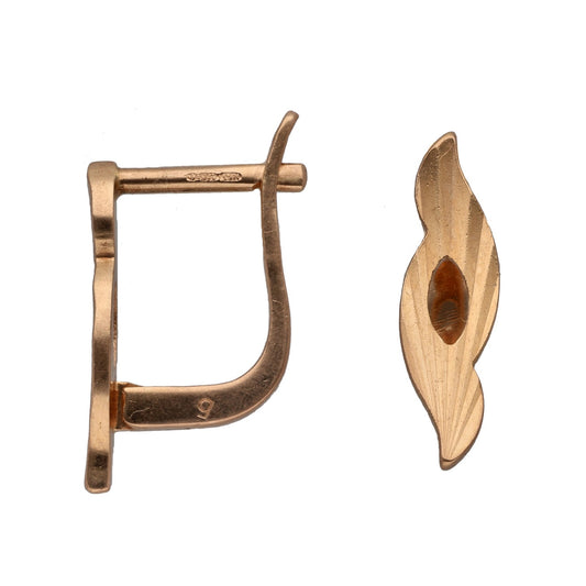Rose gold alternative hoop earrings with leaf-shaped drop and amber center