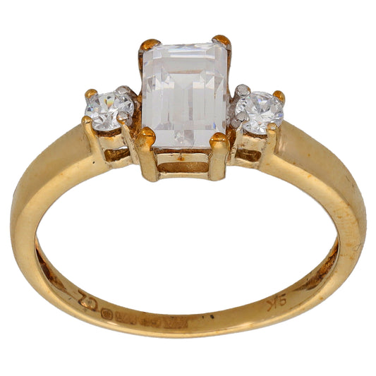Gold three-stone CZ ring with square center stone and round side stones