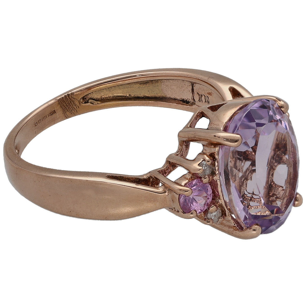 Rose gold amethyst cocktail ring, side view of oval center and purple setting