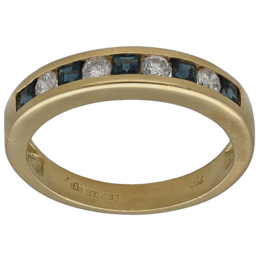 18ct gold half eternity ring with dark blue sapphires and round diamonds