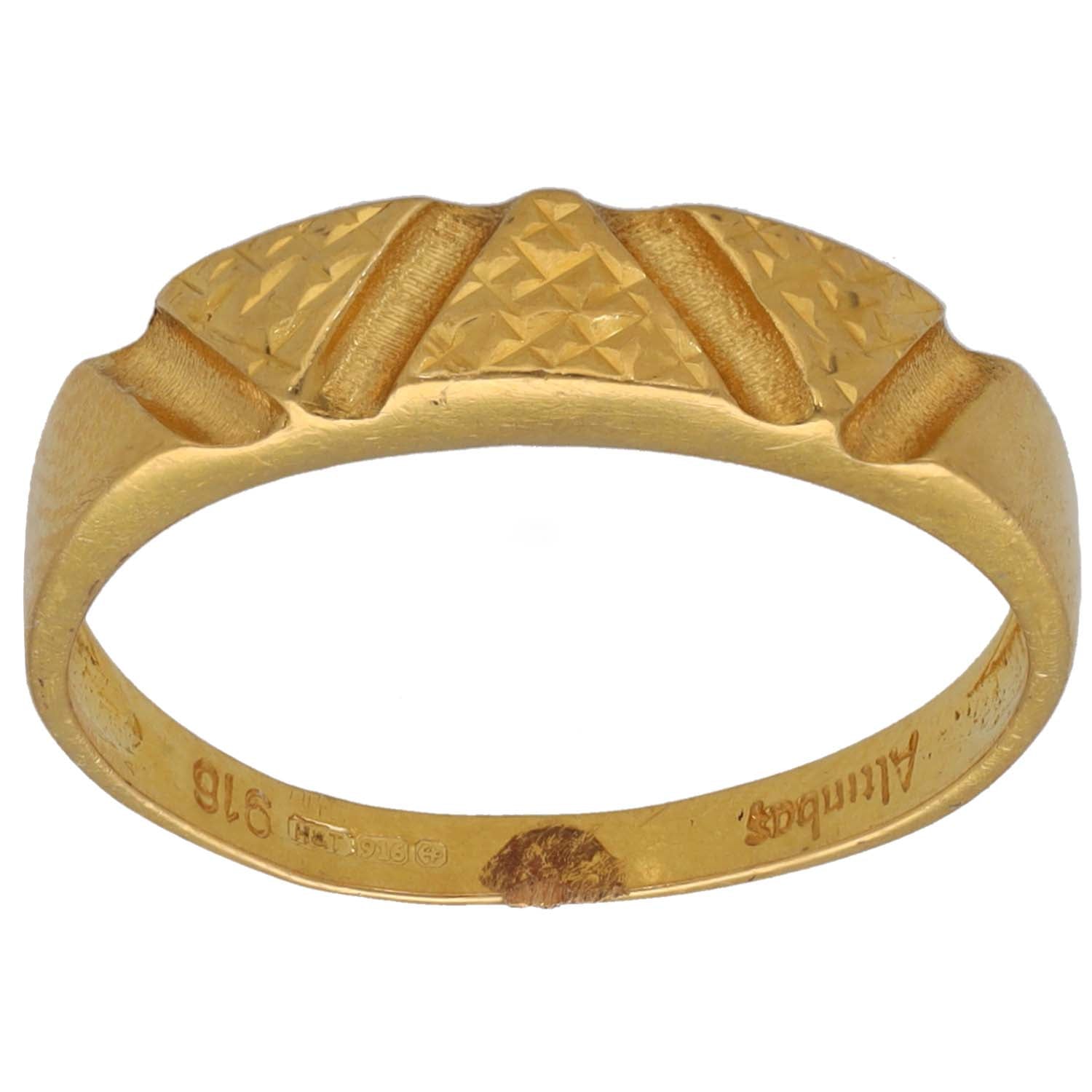 Gold-tone alternative ring with raised textured bands and patterned top