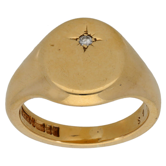 9ct gold signet ring with single round diamond on plain face
