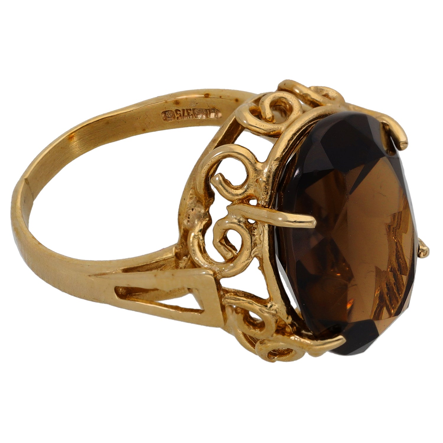 Side view of 9ct gold ring with smoky quartz single stone in openwork setting