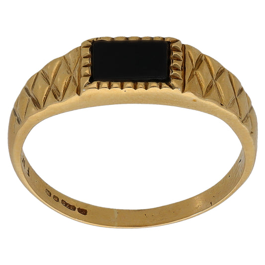 Gold-tone onyx signet ring with black rectangular stone and patterned shoulders